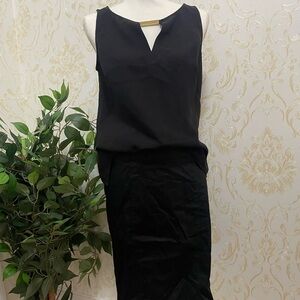 Ann Taylor black top in sz SP and EUC